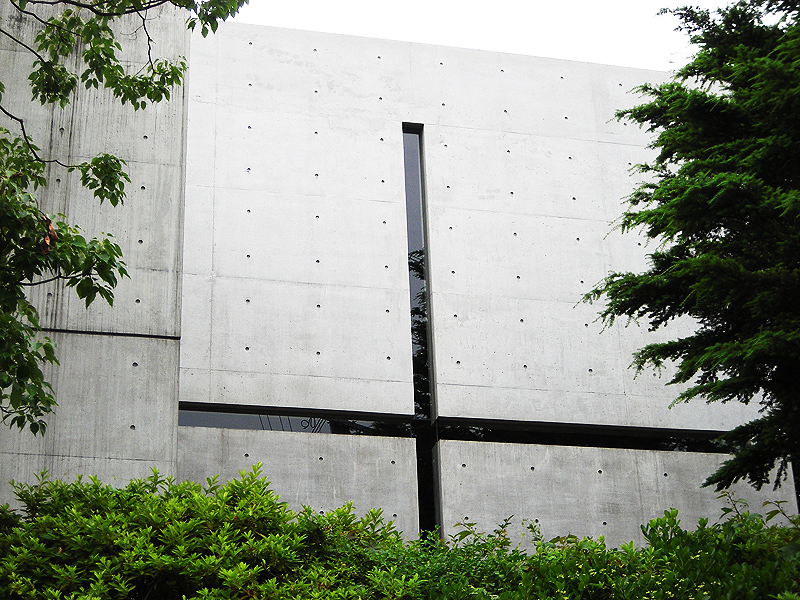 He Never Attended Architecture School. Then He Built a Church Out of Light. | ArtTour International Exterior concrete facade of the Church of the Light, Ibaraki, Osaka, with a cross-shaped window