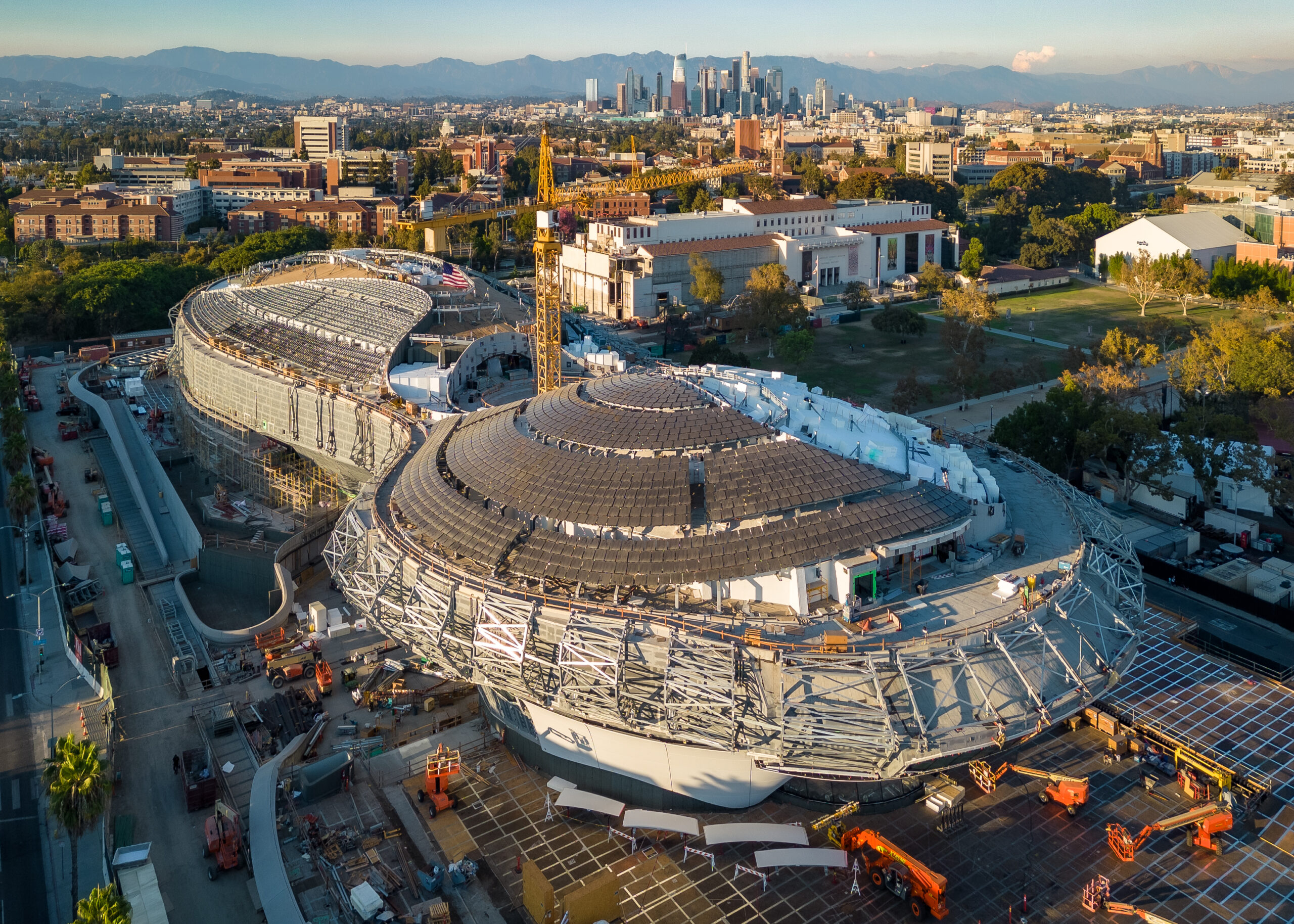 Field: featured image Aerial view of the curved Lucas Museum of Narrative Art building under construction in Los Angeles