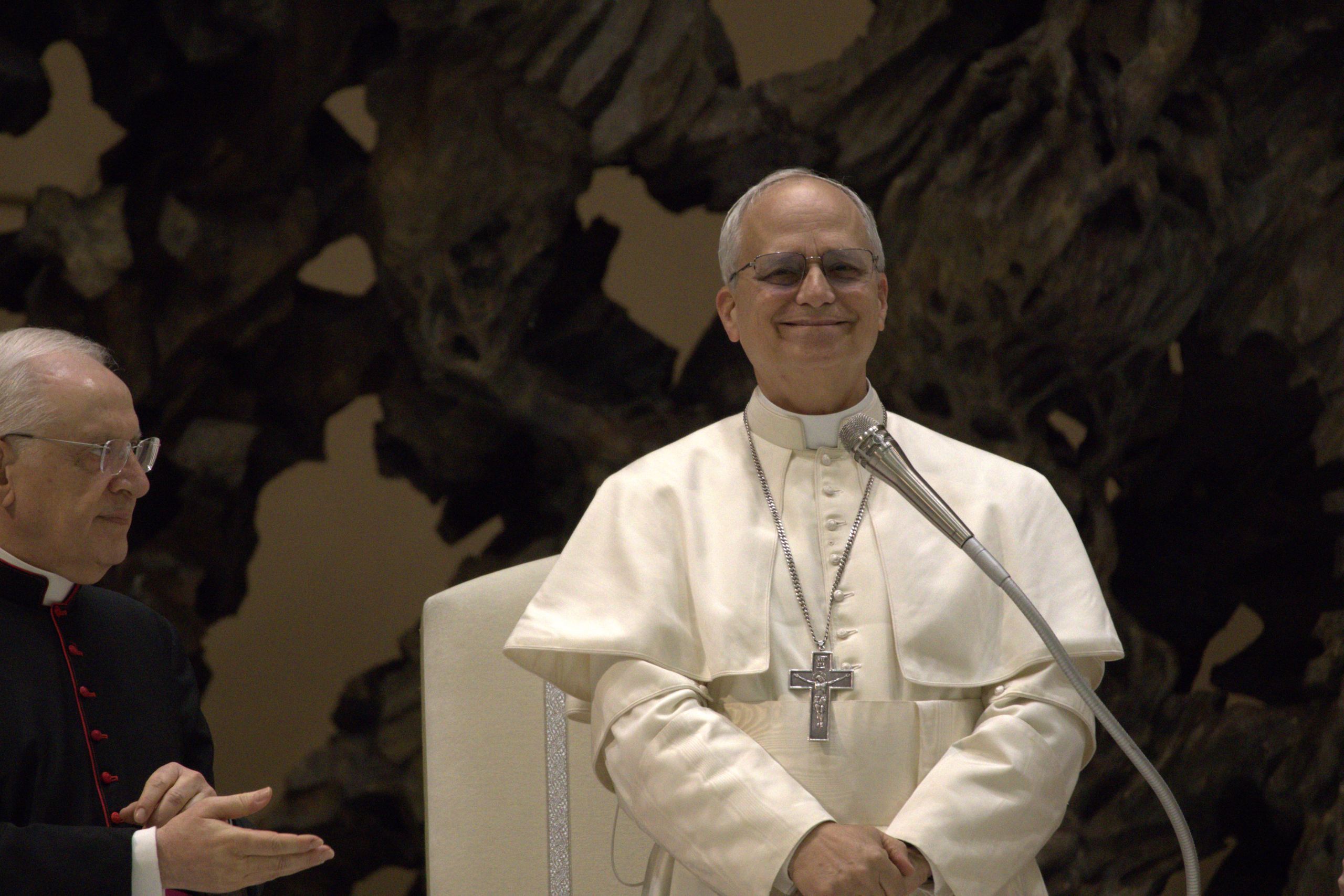 Field: featured image Pope Leo XIV wearing the white papal cassock during a media audience in May 2025