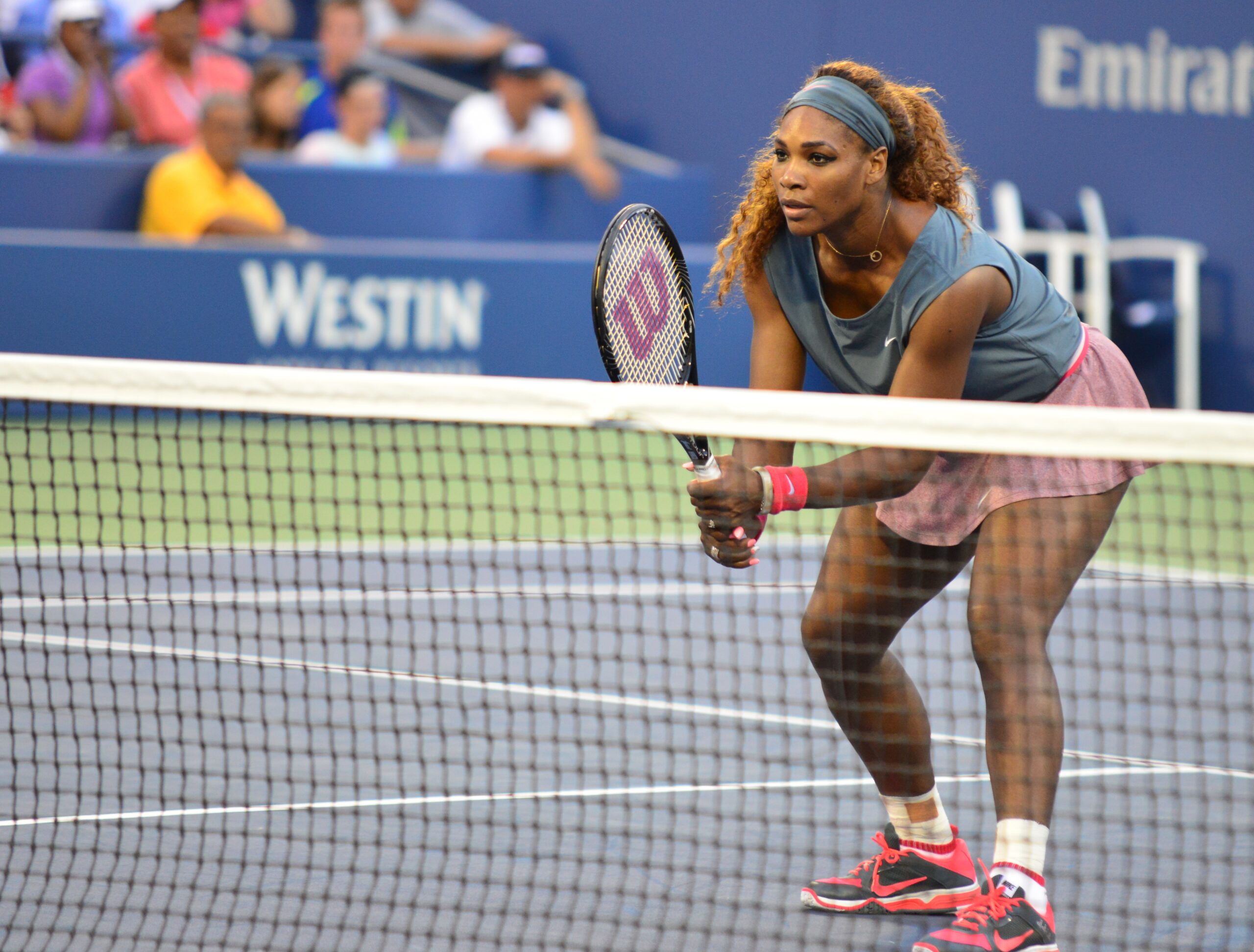 Field: featured image Serena Williams in a doubles match at the 2013 US Open.