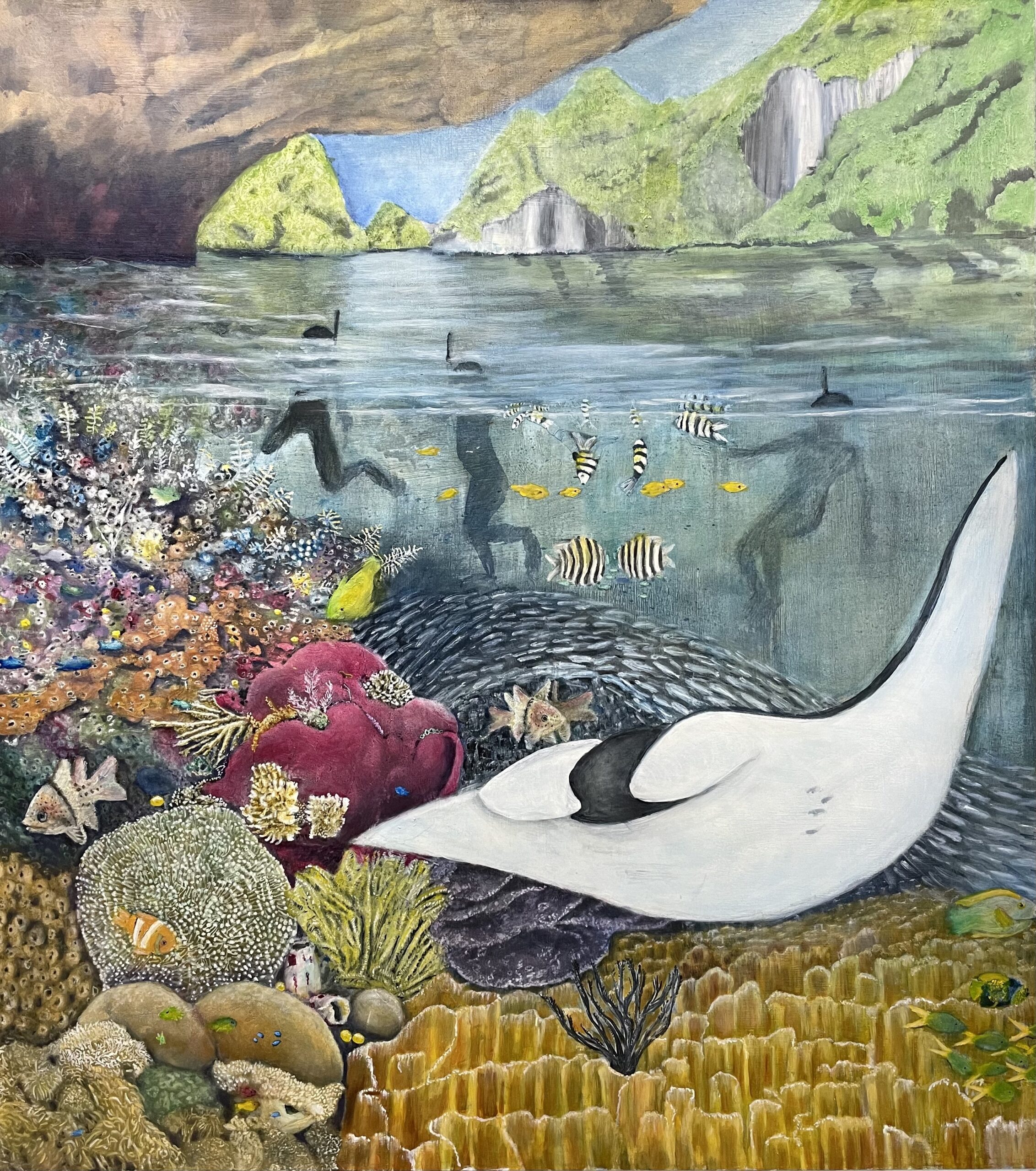 Margot McMahon: The Living World Within Our Reach | ArtTour International A ray swims above colorful coral and fish beneath a rocky coastal landscape.