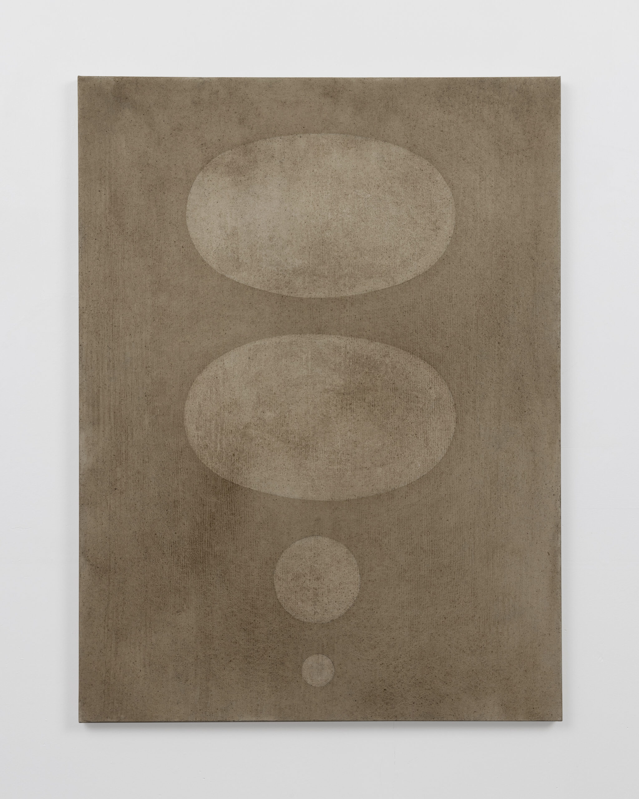 Pale sandy ovals and circles arranged vertically across a softly varied brown and beige surface.