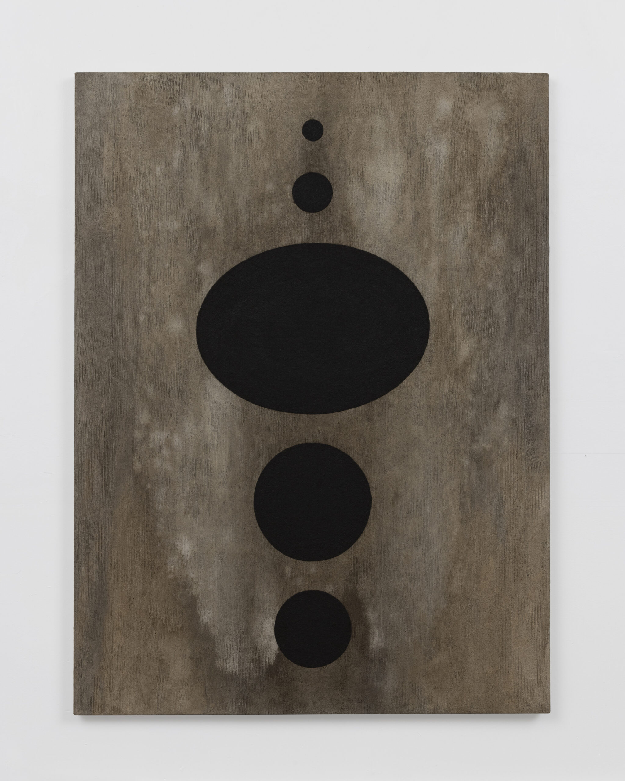 Five dark circular and oval forms aligned vertically on a textured earth-toned canvas.