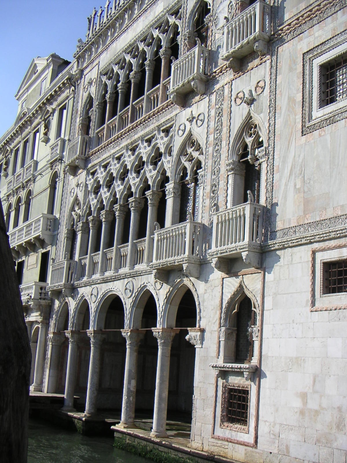 Field: featured image The ornate Gothic façade of the Ca’ d’Oro facing Venice’s Grand Canal