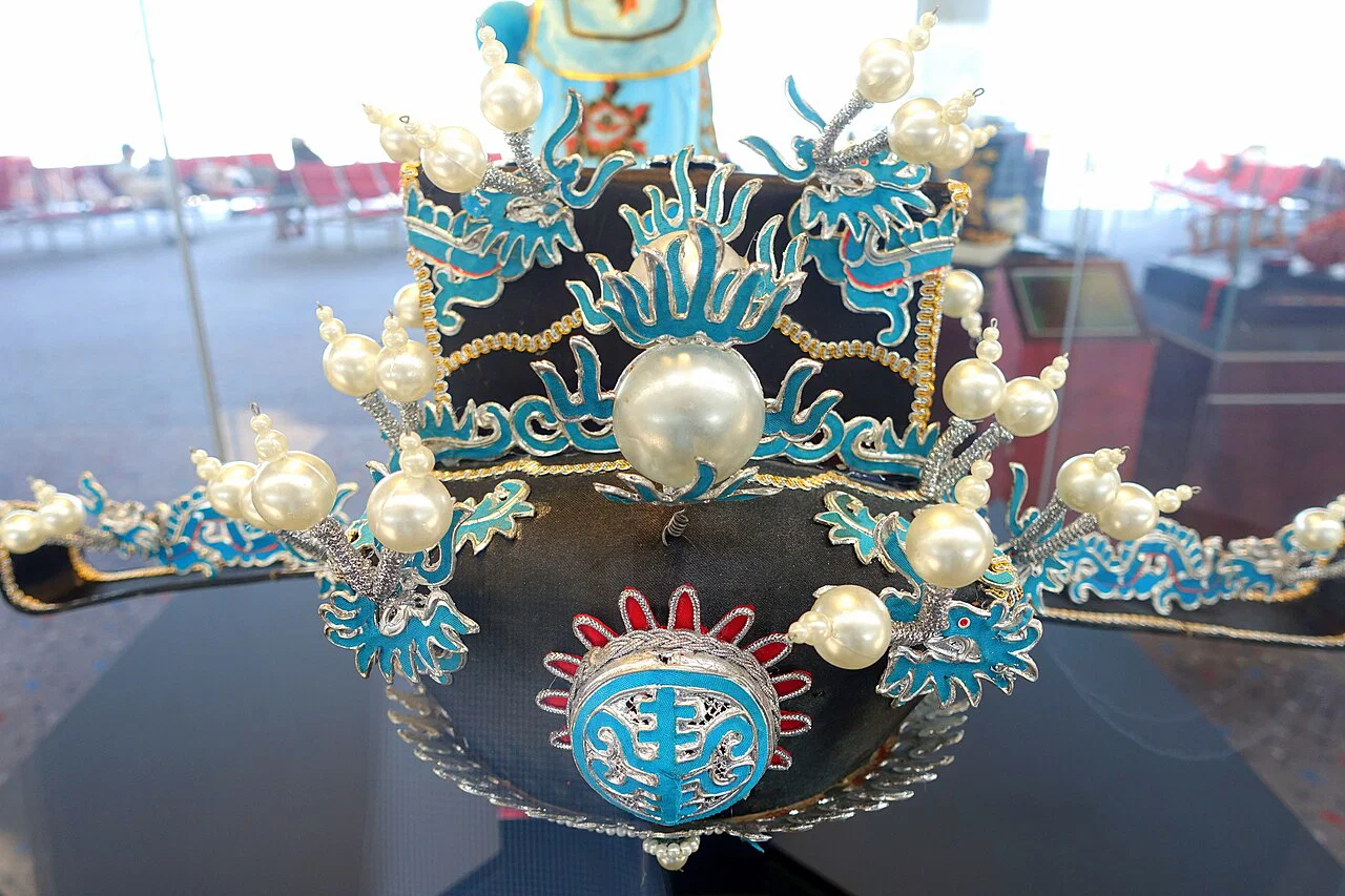 Field: featured image Ornate Cantonese opera chancellor headgear displayed in Hong Kong
