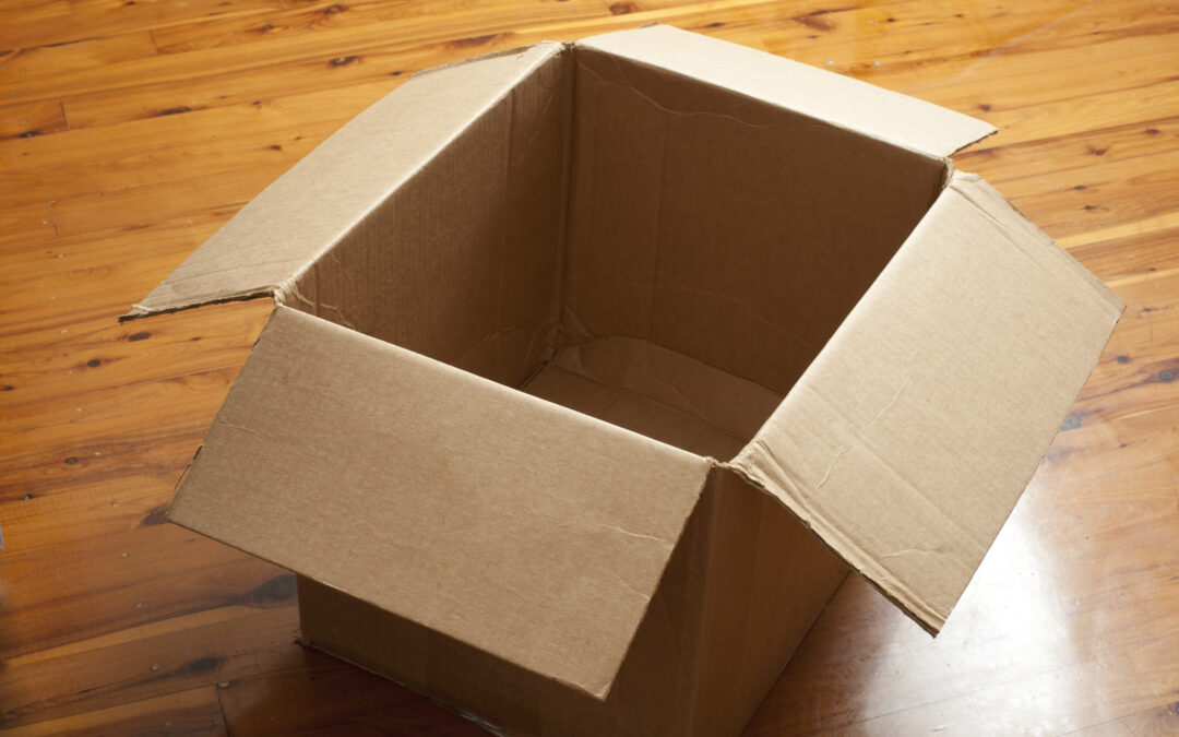 Stack of flattened cardboard boxes ready for reuse or recycling