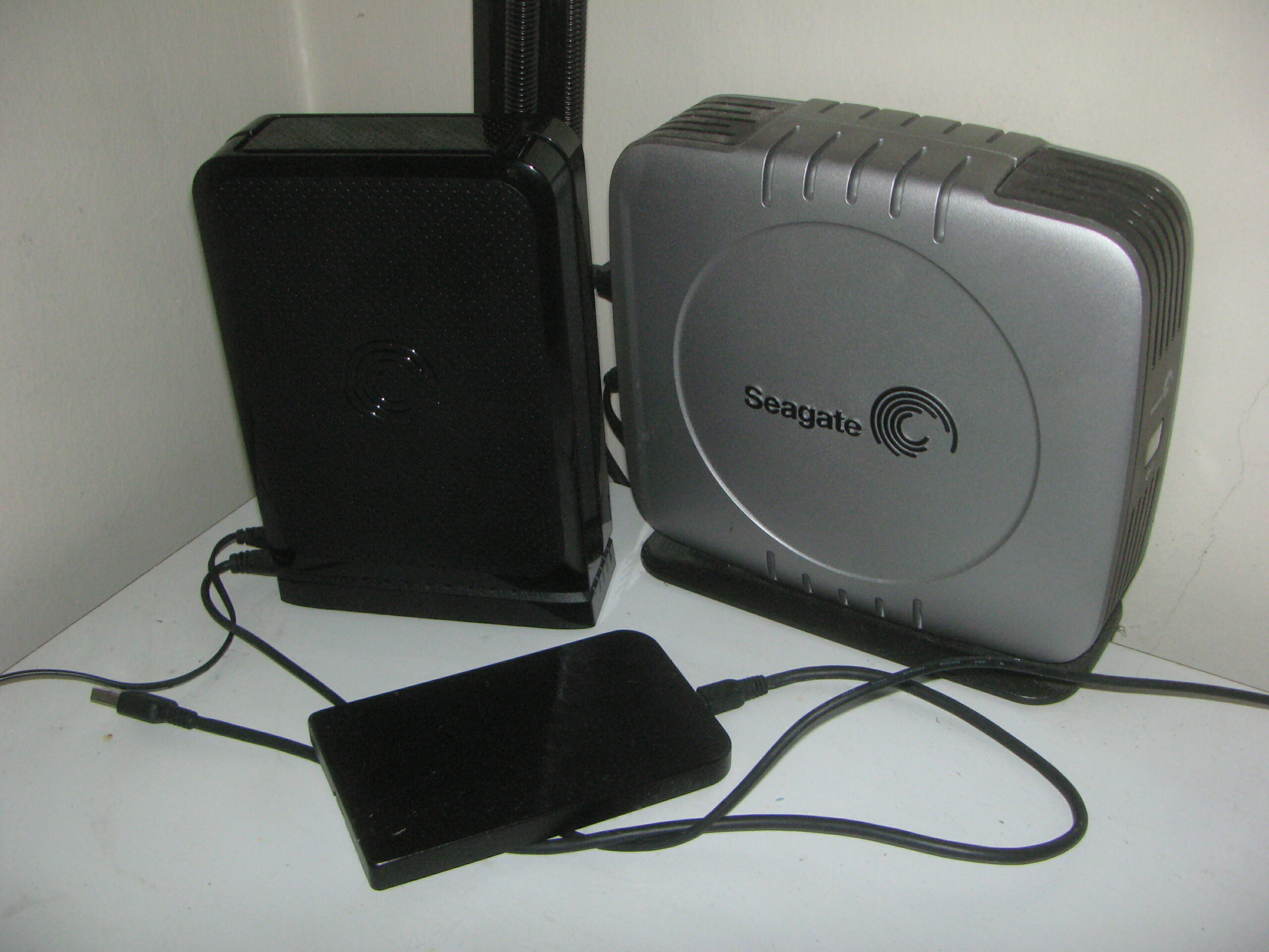 Field: featured image Several external hard drives used for digital file storage