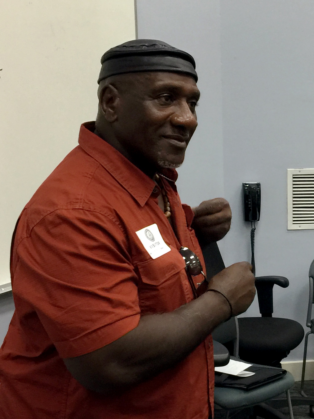 Field: featured image Gary Tyler speaking at a lectern in 2017