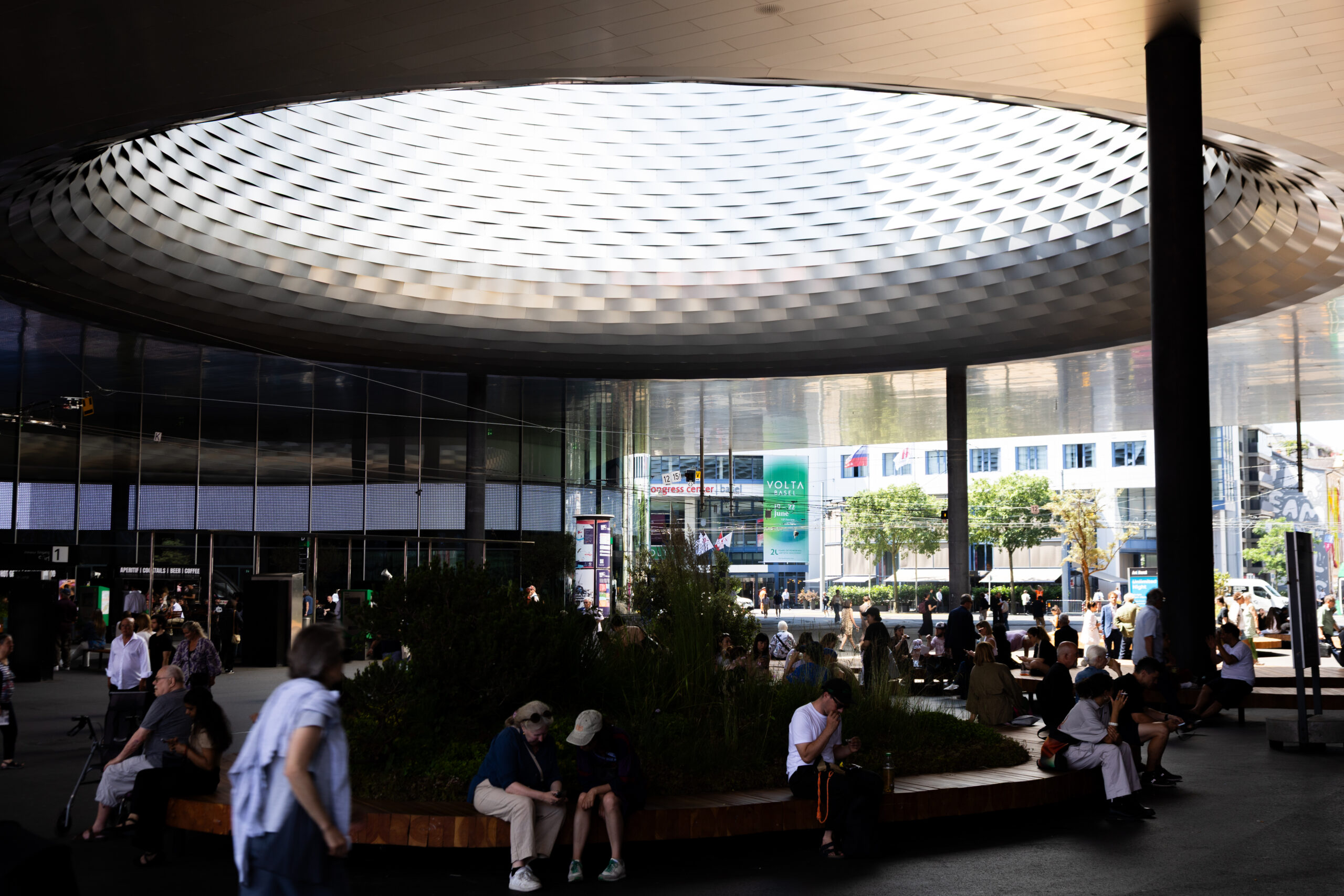 Field: featured image Visitors walking outside Messe Basel during Art Basel 2025