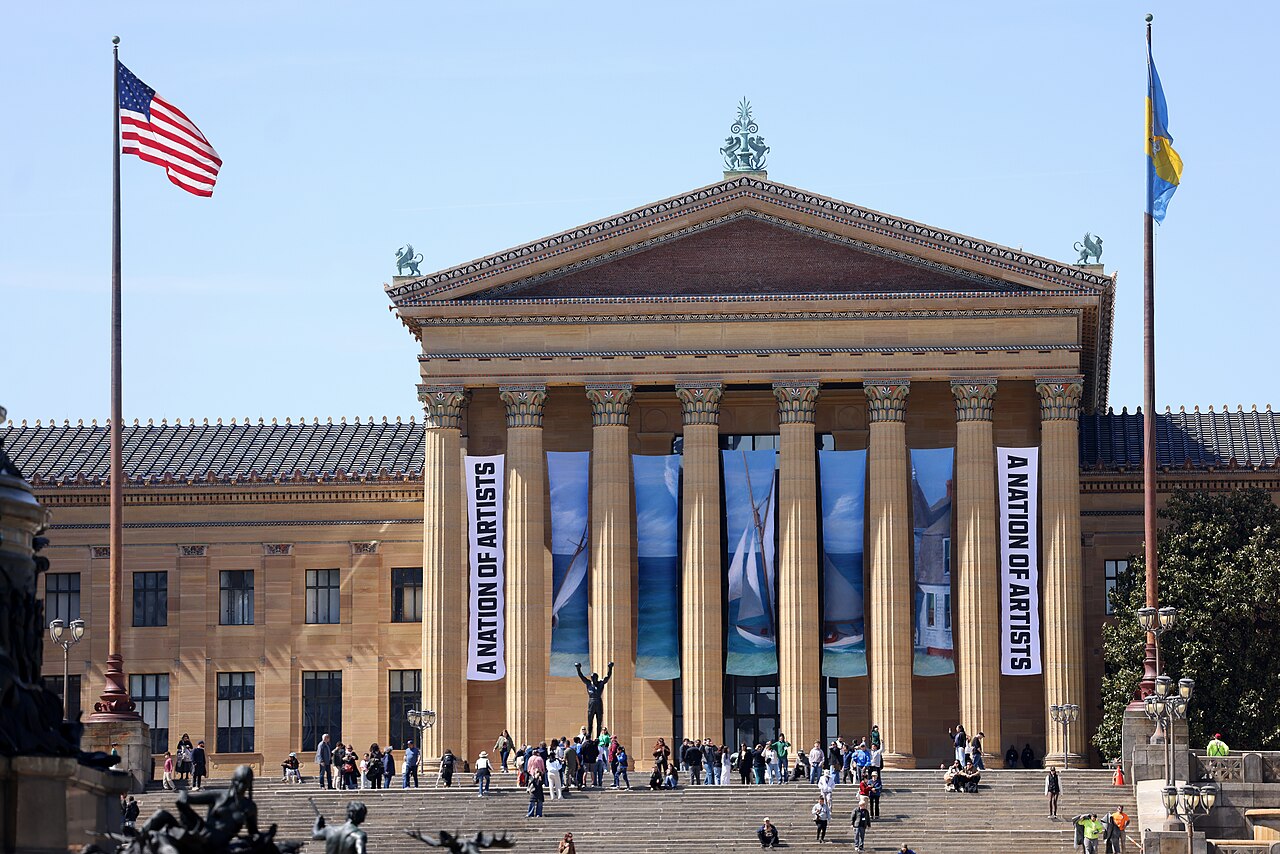 Exterior of the Philadelphia Museum of Art with visitors on the plaza