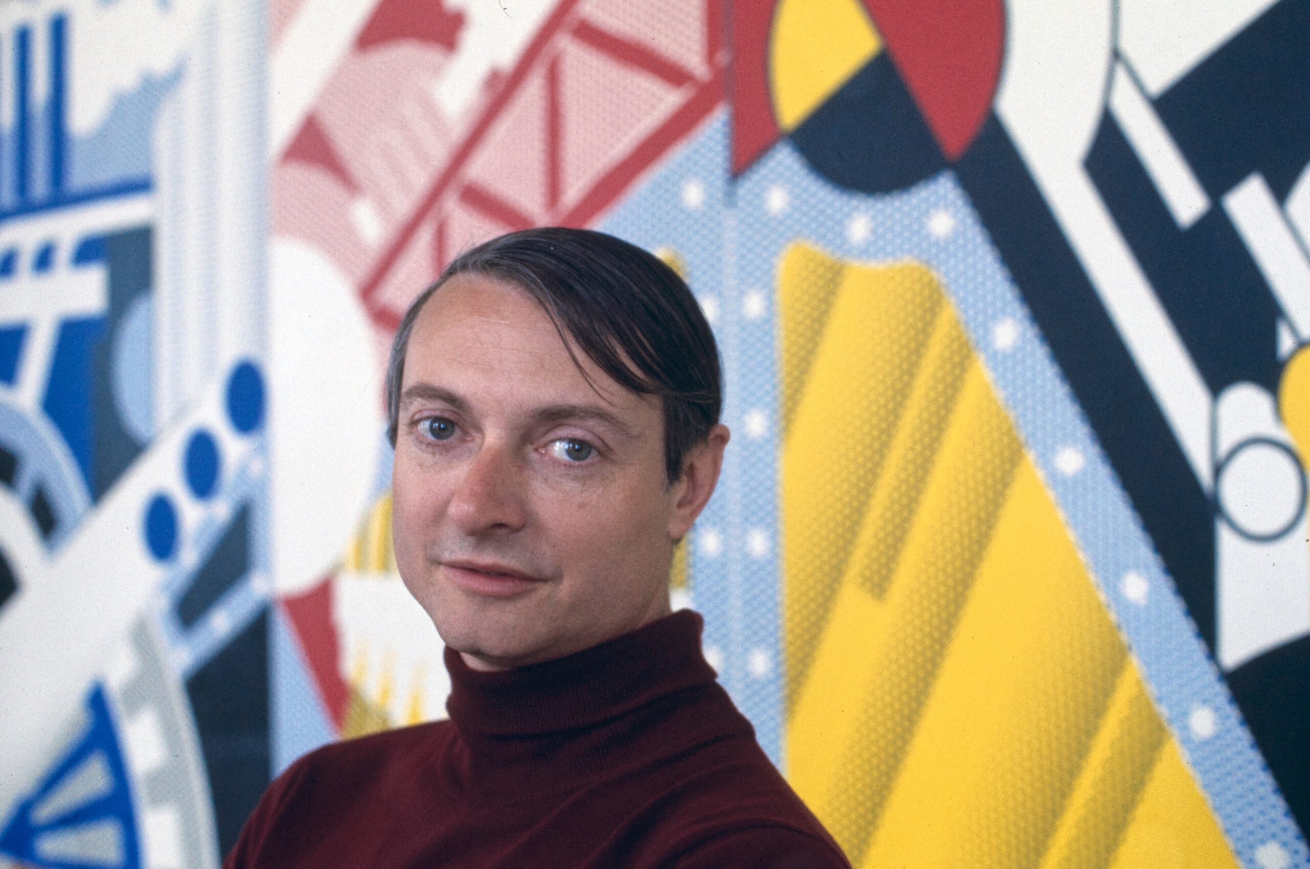 Field: featured image Artist Roy Lichtenstein seated beside a window in 1969